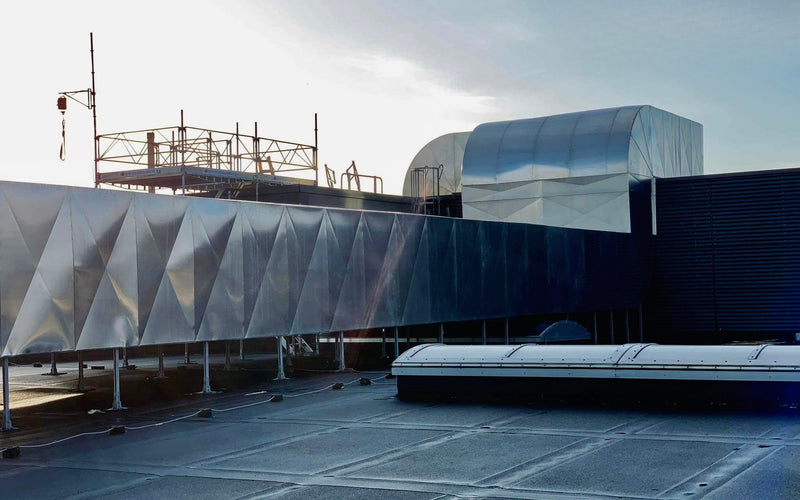 Thermal insulation and sheet metal cladding works for technical and energy systems